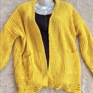 Yellow Cardigan/Sweater with two front pockets.